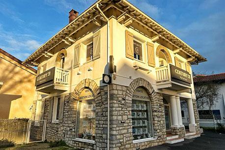 CENTURY 21 Port et Lac