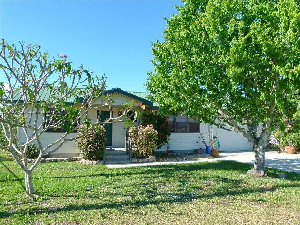 1160 20th Street, Bulkhead Ridge, Florida 34974, Estados Unidos