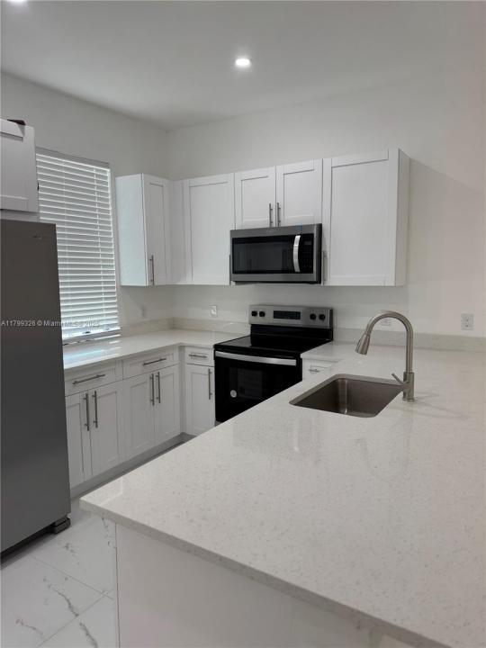 925-927 CHENAULT ST 1/2, Lehigh Acres, Florida 33974