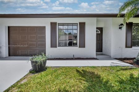 6338 Tall Cypress Cir, Green Acres, Florida 33463, USA