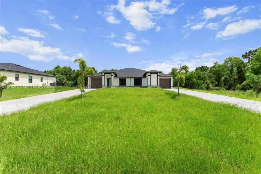 668/670 chemstrand st e, Lehigh Acres, Florida 33974