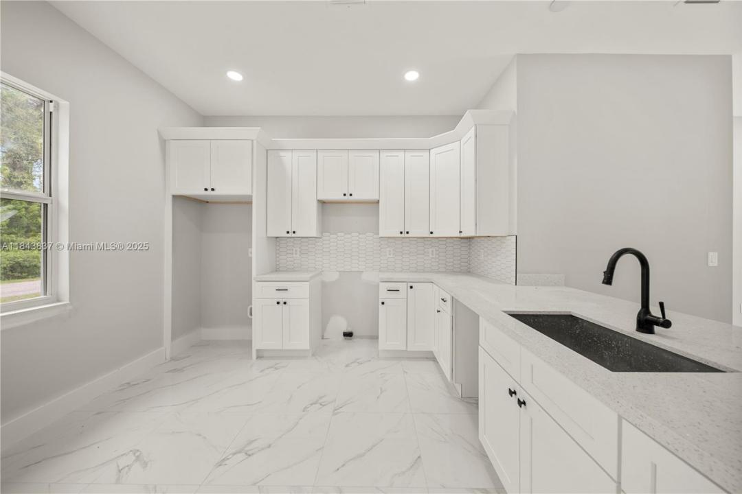 836 CLOW ST E, Lehigh Acres, Florida 33974