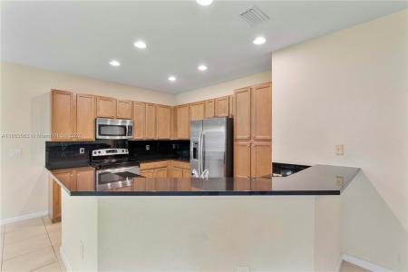 6116 E Grand Cypress Cir E, Coconut Creek, Florida 33073, USA