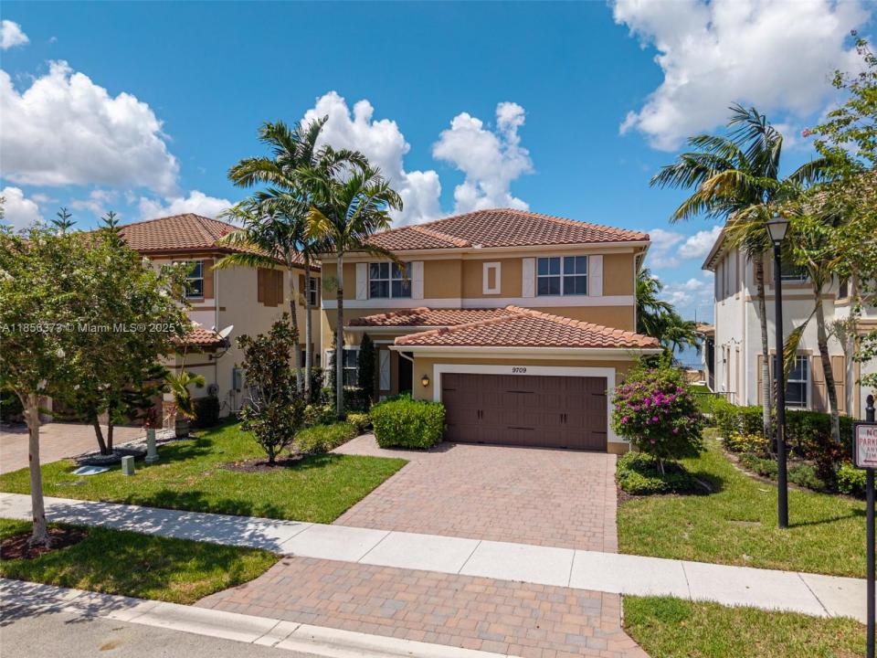 9709 Blue Isle Bay, Parkland, Florida 33076