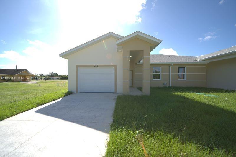 261-263 grant blvd, Lehigh Acres, Florida 33974