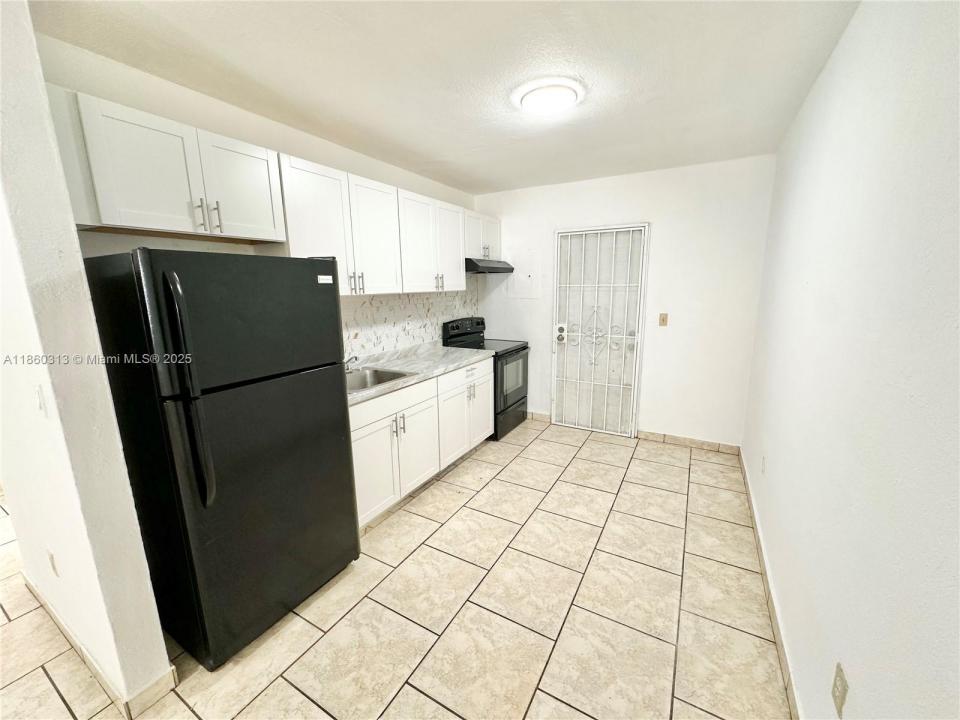 1171 NW 58th Terrace 1173, Miami, Florida 33127, USA
