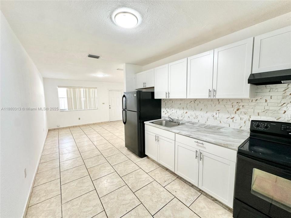 1171 NW 58th Terrace 1173, Miami, Florida 33127, USA