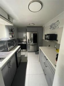 14180 SW 84th St 203-G, Miami, Florida 33183, USA