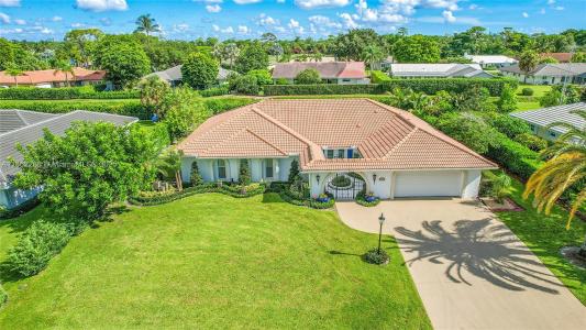 524 Muirfield Dr, Atlantis, Florida 33462, USA