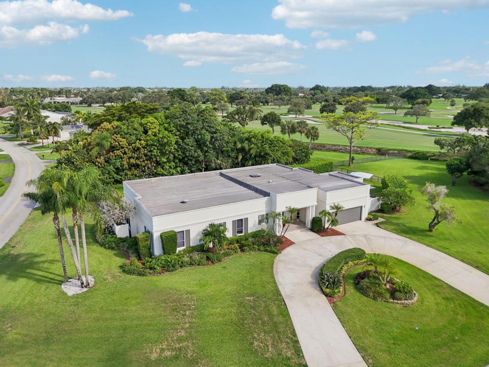 257 N Country Club Drive, Atlantis, Florida 33462, USA