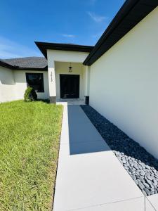 1013 Barcelona Street E, Lehigh Acres, Florida 33974