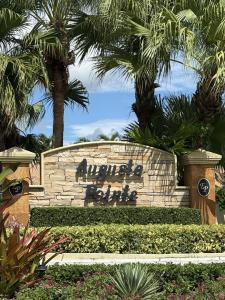 927 Augusta Pointe Drive, Palm Beach Gardens, Florida 33418