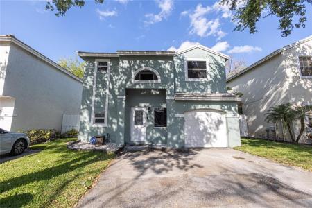 9871 NW 2nd Court, Plantation, Florida 33324