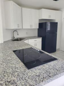 3300 Spanish Moss Ter 411, Lauderhill, Florida 33319, USA