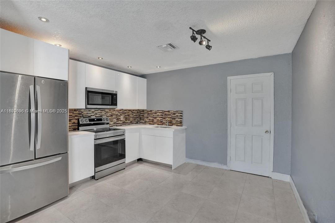 4577 NW 16th Ter, Tamarac, Флорида 33309, Соединенные Штаты