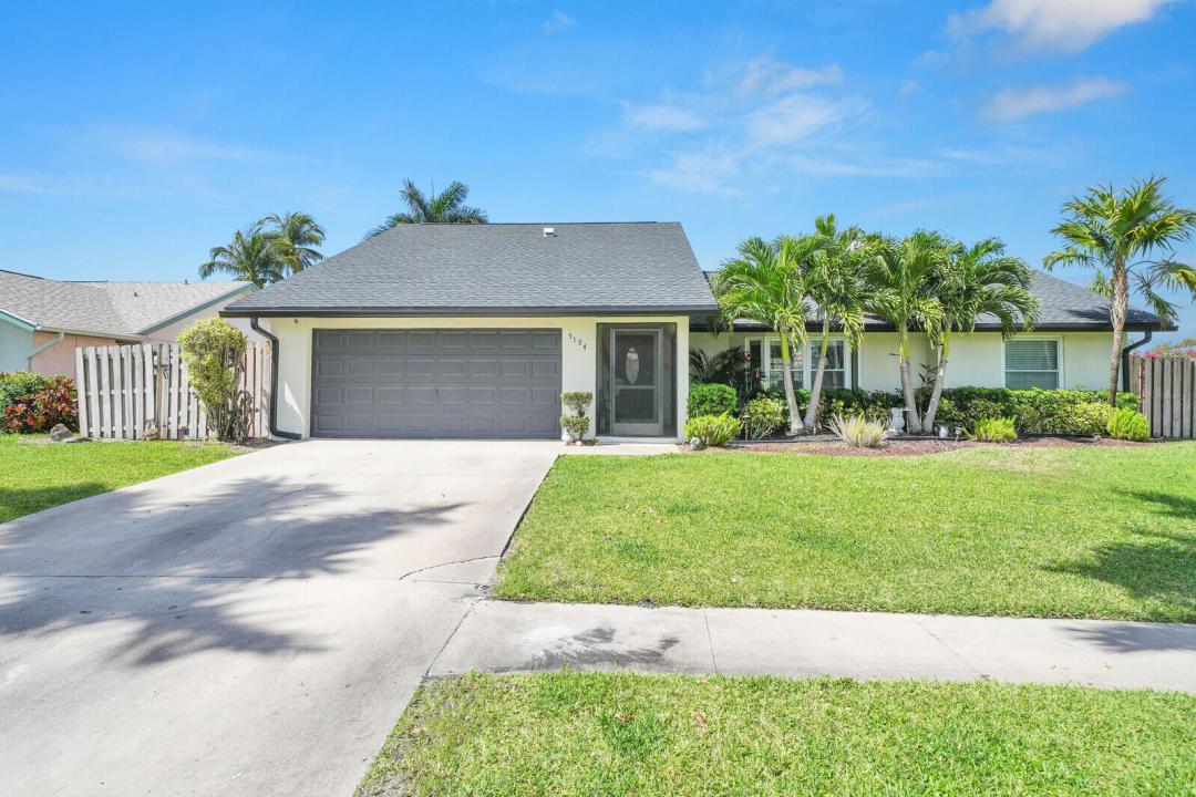 5154 Woodstone E Circle, Greenacres, Florida 33463