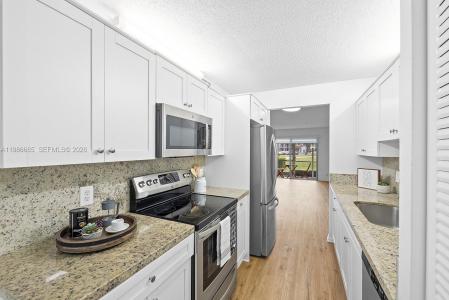 1401 SW 128th Ter 103H, Pembroke Pines, Florida 33027, USA