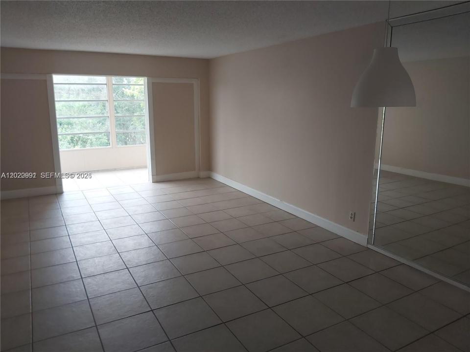 8370 Sands Point Blvd H306, Tamarac, Florida 33321, USA