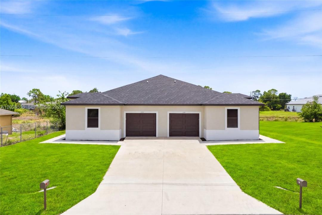 225/227 Hightower AVE S, Lehigh Acres, Florida 33973, Stati Uniti