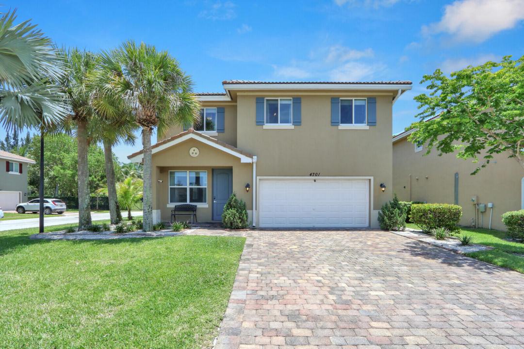 4701 Foxtail Palm Court, Greenacres, Florida 33463