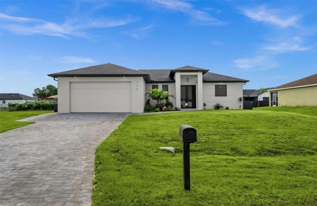 409 NW 25th PL, Cape Coral, Floride 33993, États-Unis