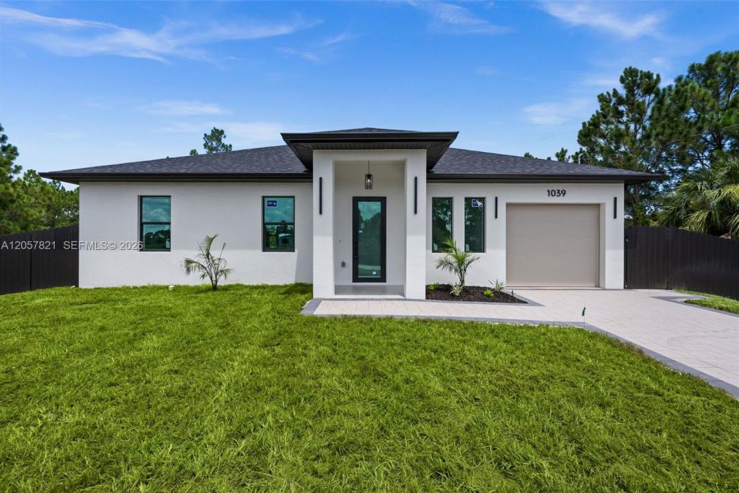 1039 Bassinger Ave S, Lehigh Acres, Floride 33974, États-Unis
