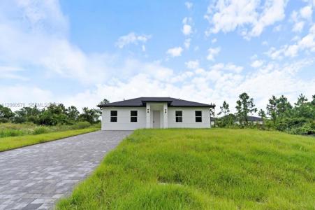 708 PEACOCK AVE, Lehigh Acres, Florida 33974, USA