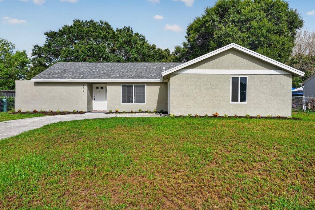 302 SW Kentwood Road, Port St. Lucie, Florida 34953, USA