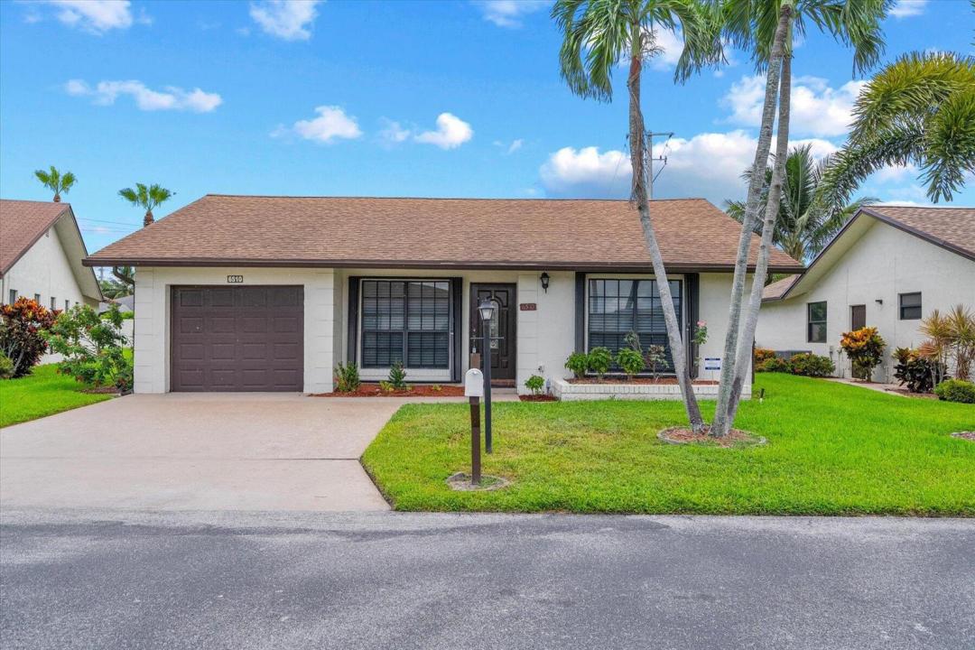 6510 OLIVEWOOD Circle, Florida 33463, USA
