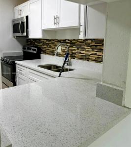 7911 N Colony Cir N 202, Tamarac, Florida 33321, USA