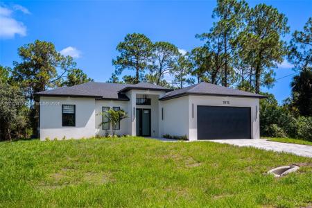 1015 E BAGGET ST, Lehigh Acres, Florida 33974, USA