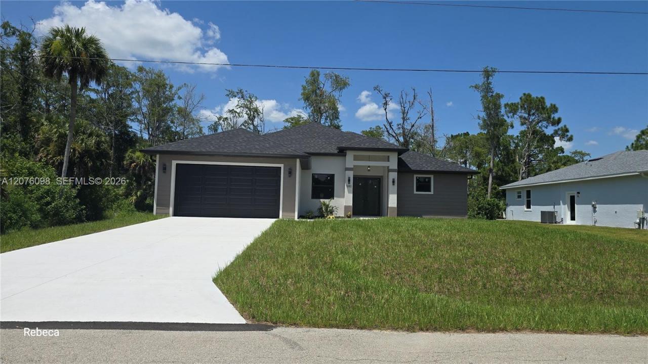 580 WOODVIEW DR, Lehigh Acres, Floryda 33972, USA