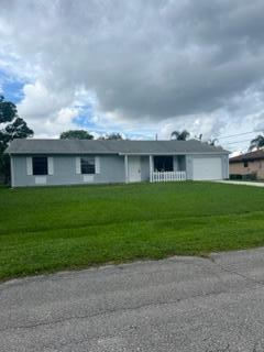 2556 SE HALLAHAN Street, Port St. Lucie, Florida 34952, USA
