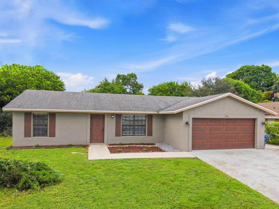 234 La Mancha Avenue, Royal Palm Beach, Florida 33411, USA