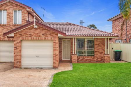 13A Lindeman Crescent, Green Valley, NSW 2168, Australia
