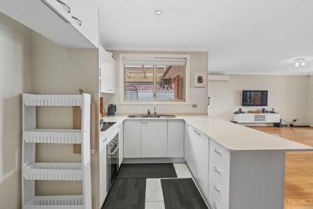 13A Lindeman Crescent, Green Valley, NSW 2168, Australia