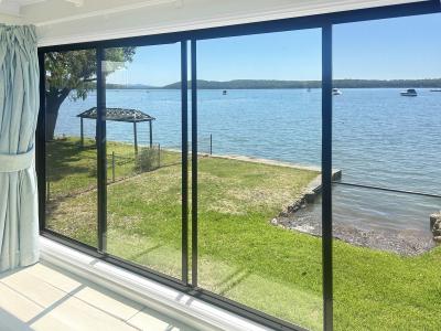 16 Cove Blvd, North Arm Cove, NSW 2324, Australia