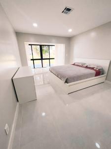 1731 Presidential Way C203, West Palm Beach, Floride 33401, États-Unis