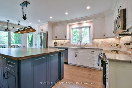 34 CAIRNS BOULEVARD, Springwater, Ontario L9X 0N8, Canadá