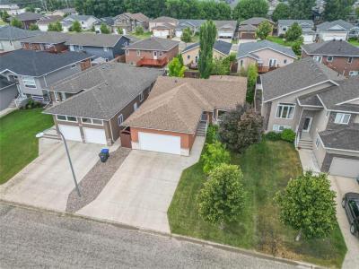 14 FROBISHER CRESCENT, Brandon, Manitoba R7A 5B9, CANADÁ