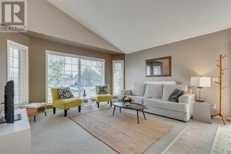 303 CIMARRON BOULEVARD, Okotoks, Alberta T1S 2H2, Canadá
