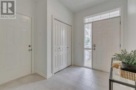 124 TUCKER CIRCLE, Okotoks, Альберта T1S 2J8, Канада