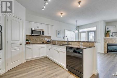 124 TUCKER CIRCLE, Okotoks, Альберта T1S 2J8, Канада