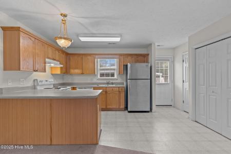 135 NE 15th Street, Oak Island, North Carolina 28465, USA