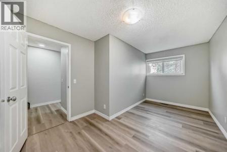 7 WESTLAND ROAD, Okotoks, Alberta T1S 1Z1, Canada