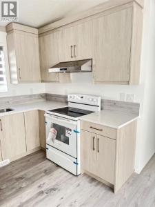 98 TARAWOOD ROAD NORTHEAST, Calgary, Alberta T3J 5B2, Kanada