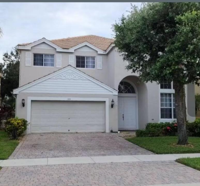 305 Berenger Walk, Royal Palm Beach, Florida 33414