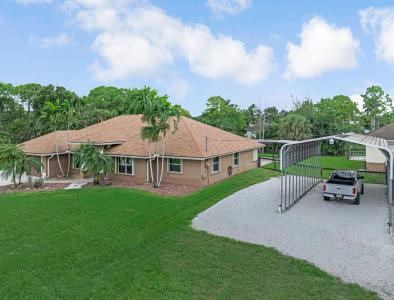15097 N 72nd Court, The Acreage, Florida 33470