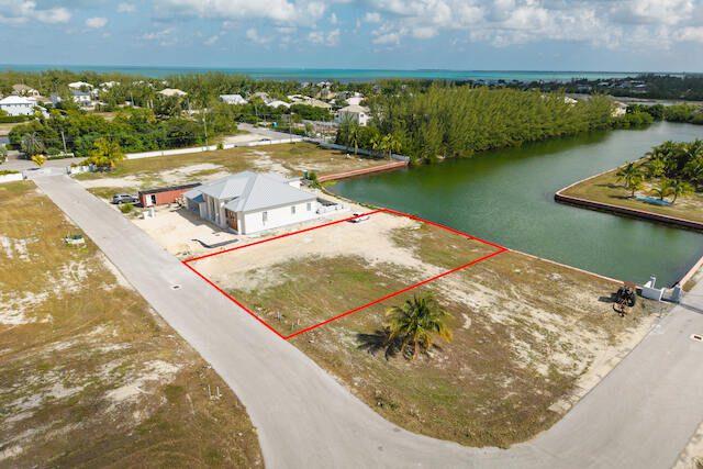 0.24 ACRE CANAL LOT IN GATED COMMUNITY - MUSTIQUE COVE, Prospect, Grand Cayman, Iles Caïmans